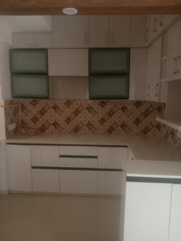 Kitchen in 2 BHK Apartment at Mahagun Mywoods, Sector 16c Greater Noida – for Rent