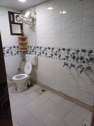 Bathroom in 2.5 BHK Apartment at Paschim Vihar – for Rent