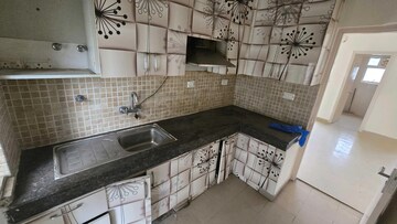 Kitchen in 3 BHK Apartment at Orris Aster Court, Sector 85 – for Sale