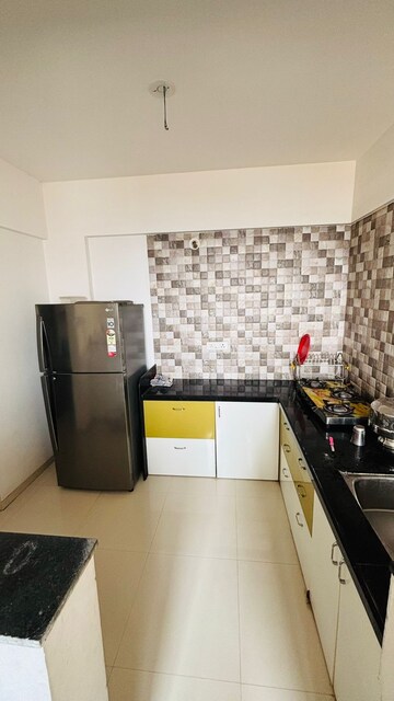 Kitchen in 3 BHK Apartment at Goel Ganga Wagholi Township, Wagholi – for Sale