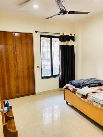 Bedroom in 2 BHK Apartment at Swastik Regalia, Waghbil – for Rent