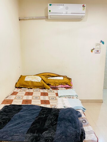 Bedroom in 2 BHK Apartment at Swastik Regalia, Waghbil – for Rent