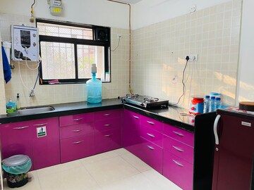 Kitchen in 2 BHK Apartment at Swastik Regalia, Waghbil – for Rent