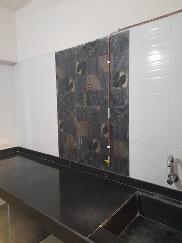 Kitchen in 2 BHK Apartment at Vijay Annex 11, Waghbil – for Sale