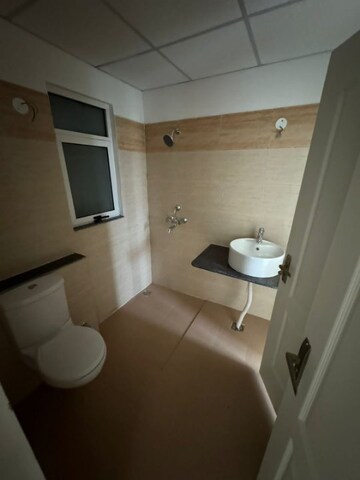 Bathroom in 3 BHK Apartment at Sushma Valencia, International Airport Road – for Rent
