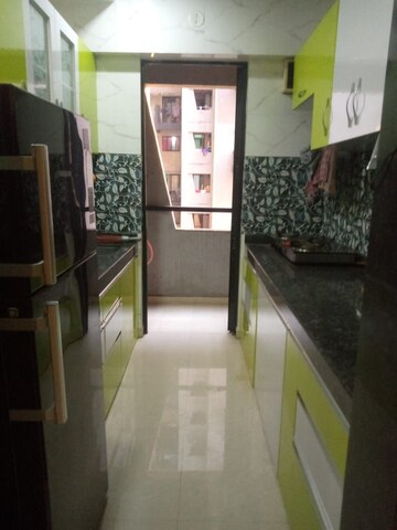Kitchen in 1 BHK Apartment at Lodha Palava Eviva K To T Urbano A C F and I To T, Dombivli East – for Rent