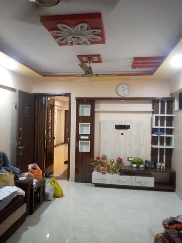 Living Room in 1 BHK Apartment at Lodha Palava Eviva K To T Urbano A C F and I To T, Dombivli East – for Rent