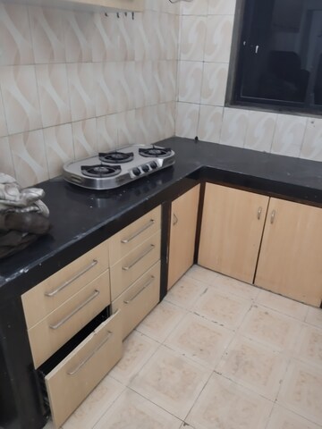 Kitchen in 2 BHK Apartment at Divya Jyoti CHS Vashi, Sector 28 – for Rent