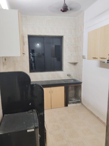 Kitchen in 2 BHK Apartment at Divya Jyoti CHS Vashi, Sector 28 – for Rent