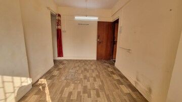 Living Room in 1 BHK Apartment at Kirit CHS, Malad West – for Rent