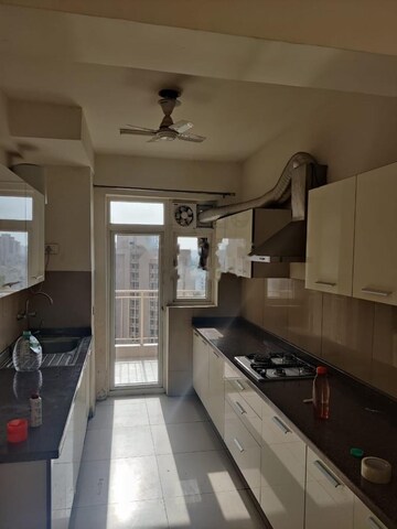 Kitchen in 3 BHK Apartment at DLF Regal Gardens, Sector 90 – for Rent