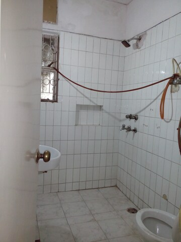 Bathroom in 3 BHK Apartment at Sarita Vihar – for Sale