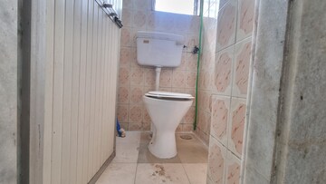 Bathroom in 1 BHK Apartment at Rishikesh CHS, Malad West – for Rent