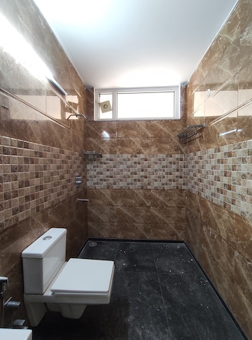 Bathroom in 4 BHK Apartment at Vasant Kunj – for Rent