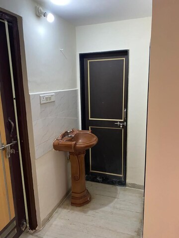 Bathroom in 2 BHK Apartment at Deokar Residency, Wadgaon Sheri – for Rent