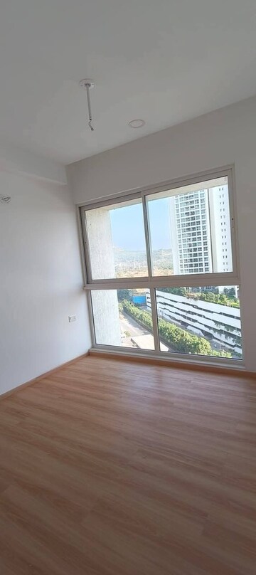 Bedroom in 2 BHK Apartment at Aurum Q Residences, Ghansoli – for Rent