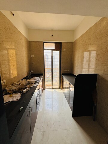 Building Lobby in 2 BHK Apartment at Vastusankalp Punyodaya Rio, Kalyan West – for Rent
