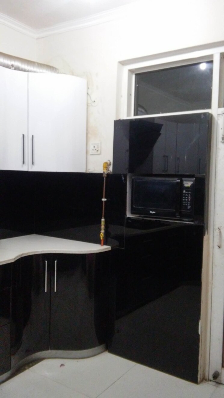Kitchen, paramount-symphony 2.5 Bedroom 1410 Sq.Ft. Apartment In Sain Vihar Ghaziabad 8210405