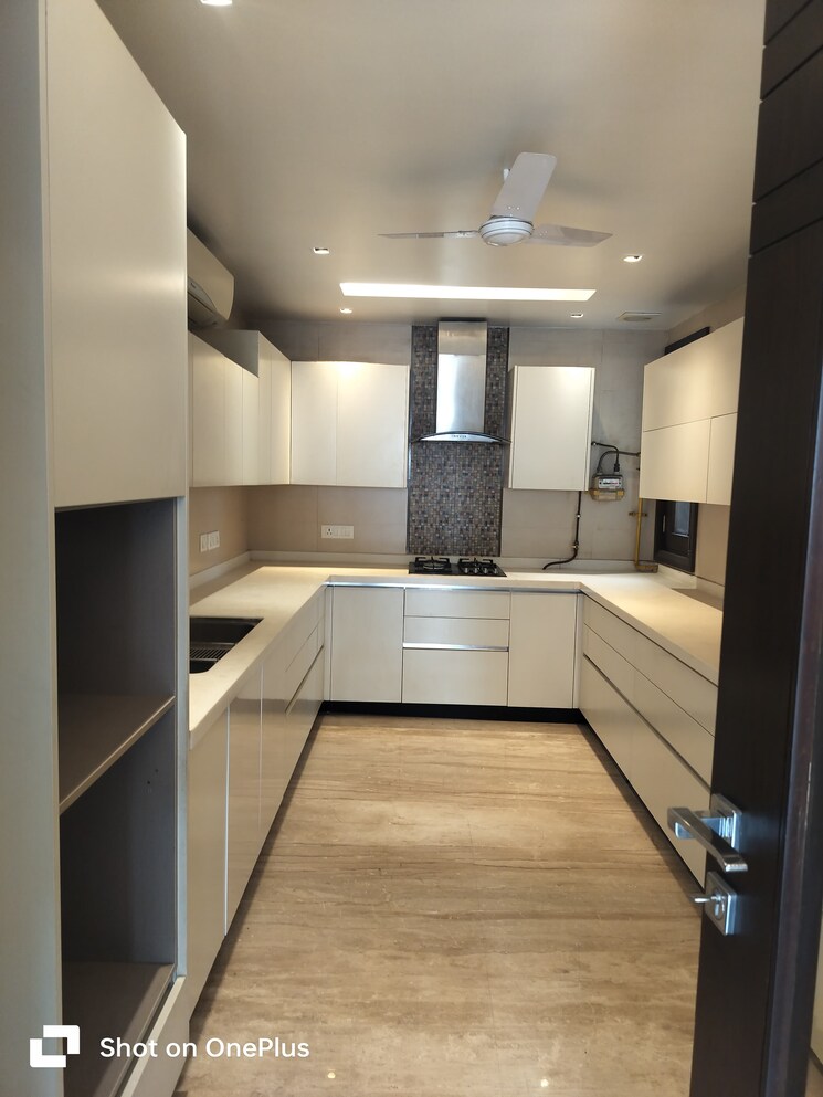 Kitchen, safdarjung development area 4 Bedroom 300 Sq.Yd. Builder Floor In Safdarjung Development Area Delhi 8210409