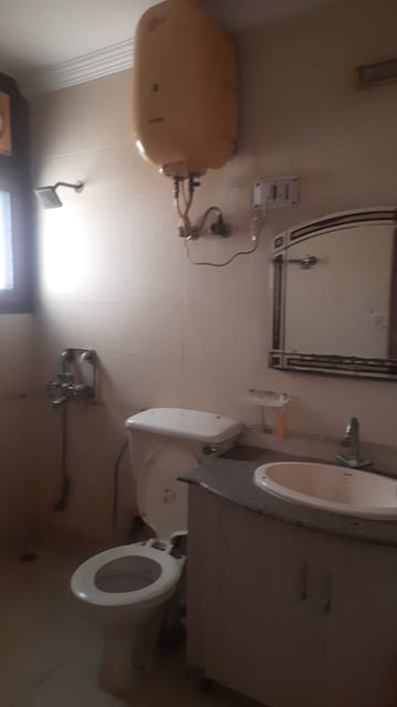 Bathroom in 3 BHK Apartment at Sector 6, Dwarka – for Rent