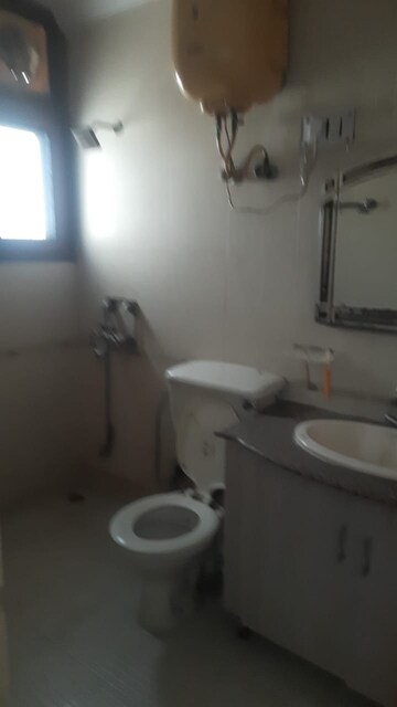 Bathroom in 3 BHK Apartment at Sector 6, Dwarka – for Rent