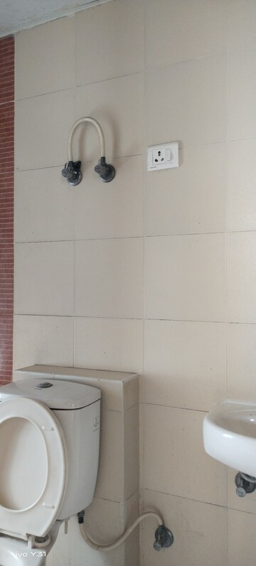 Bathroom in 2 BHK Apartment at Mahagun Mywoods, Sector 16c Greater Noida – for Rent