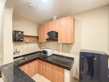 Kitchen in 4 BHK Apartment at DLF Westend Heights, Sector 53 – for Sale