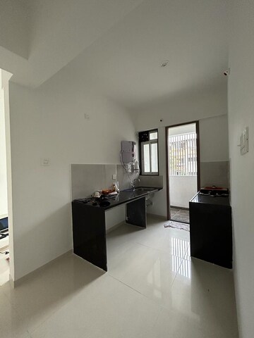 Kitchen in 1 BHK Apartment at Abhinav Pebbles Urbania, Bavdhan – for Rent