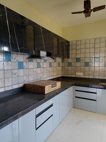 Kitchen in 3 BHK Apartment at Paradise Sai World City Phase 2, New Panvel – for Rent