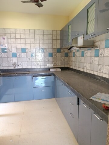 Kitchen in 2 BHK Apartment at Paradise Lifespaces Sai World City, New Panvel – for Rent