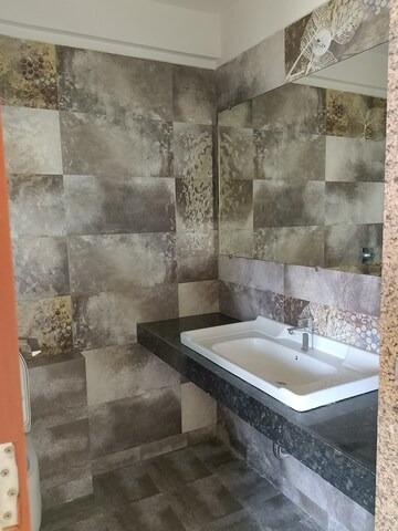 Bathroom in 2 BHK Apartment at Paradise Lifespaces Sai World City, New Panvel – for Rent