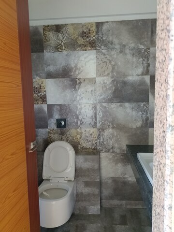 Bathroom in 2 BHK Apartment at Paradise Lifespaces Sai World City, New Panvel – for Rent