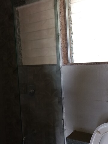 Bathroom in 2 BHK Apartment at Paradise Lifespaces Sai World City, New Panvel – for Rent