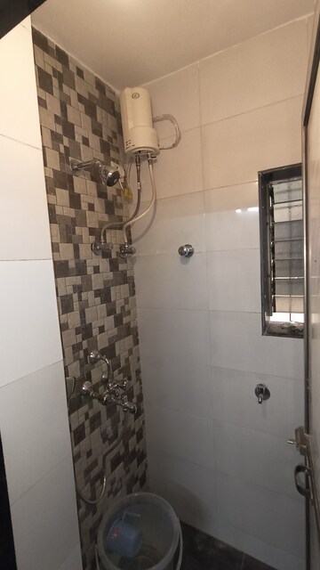 Bathroom in 1 BHK Apartment at Malad CHS, Malad East – for Rent