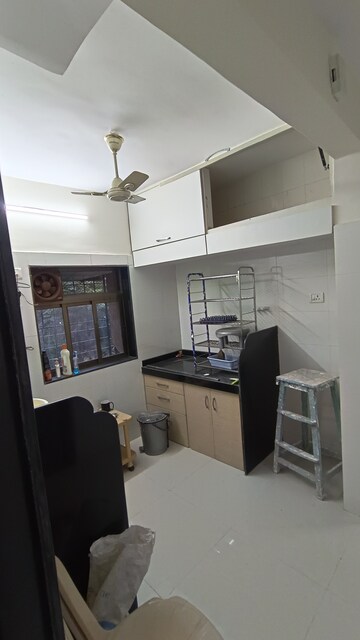 Kitchen in 1 BHK Apartment at Malad CHS, Malad East – for Rent