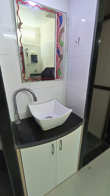 Bathroom in 1 BHK Apartment at Malad CHS, Malad East – for Rent
