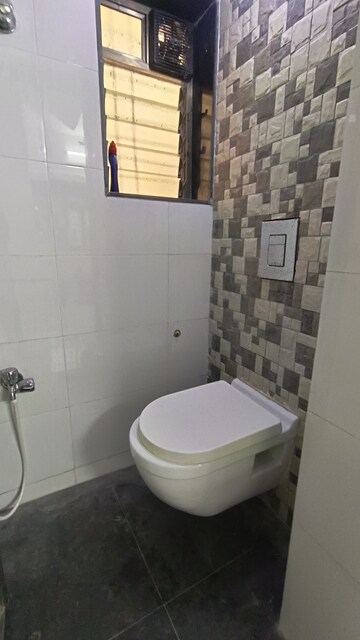 Bathroom in 1 BHK Apartment at Malad CHS, Malad East – for Rent