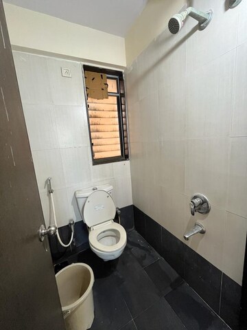 Bathroom in 2 BHK Apartment at Neptune Living Point, Bhandup West – for Rent