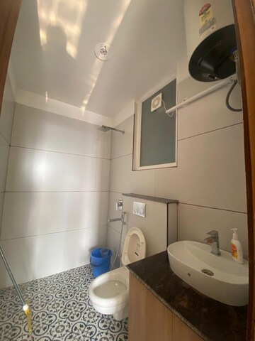 Bathroom in 3 BHK Apartment at GVT Beliston Avenue, Dhakoli Village – for Rent