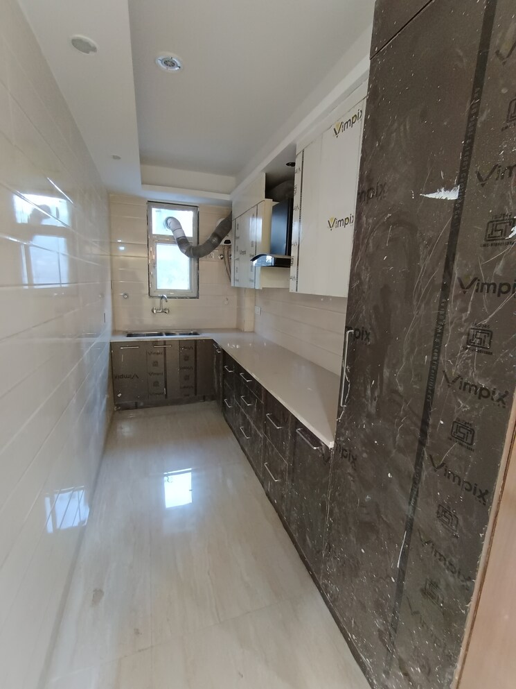 Kitchen, raheja-vedaanta 3 Bedroom 1833 Sq.Ft. Apartment In Sector 108 Gurgaon 8210926