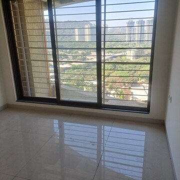 Room in 2 BHK Apartment at Acme Ozone, Manpada – for Sale
