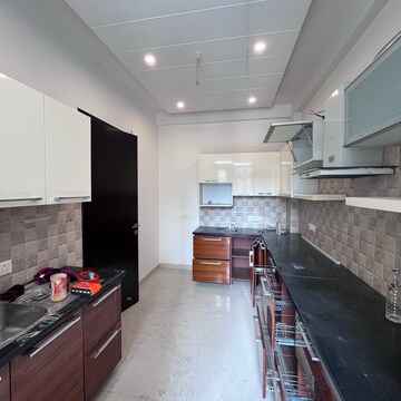 Kitchen in 3.5 BHK Builder Floor at Ansal Sushant Lok I, Sector 43 – for Rent
