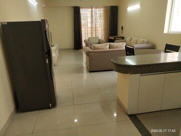 Living Room in 2 BHK Apartment at Emaar The Palm Drive-Palm Studios, Sector 66 – for Rent