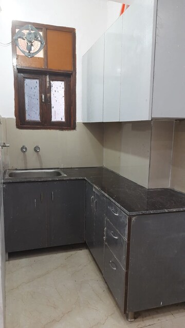 Kitchen in 2 BHK Builder Floor at Mahavir Enclave 1 – for Sale