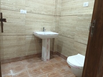 Bathroom in 2 BHK Apartment at Amrapali Golf Homes, Sector 4, Greater Noida – for Sale