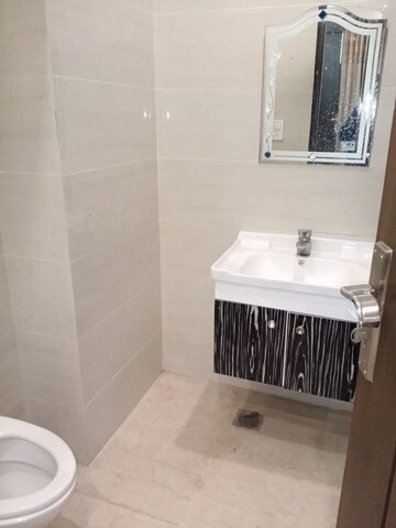 Bathroom in 3 BHK Apartment at Nirman Vihar – for Rent