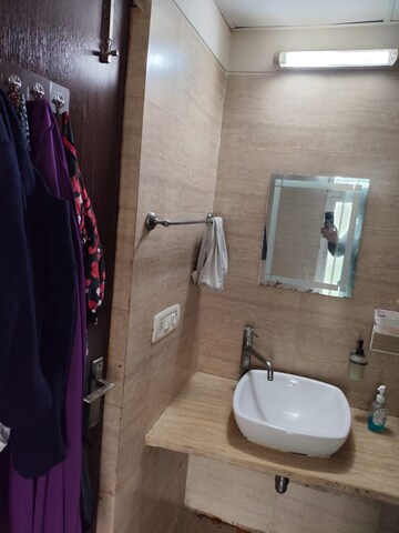 Bathroom in 3 BHK Apartment at Mahagun Moderne, Sector 78 – for Sale