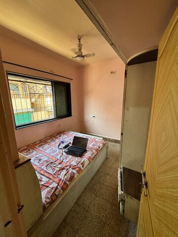 Bedroom in 1 BHK Apartment at Nityanand CHS Dhankawadi, Dhankawadi – for Rent