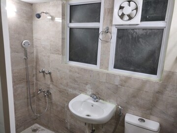Bathroom in 1 BHK Apartment at Wave Dream Homes, Wave City – for Rent
