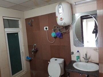 Bathroom in 4 BHK Apartment at Mahagun Moderne, Sector 78 – for Sale
